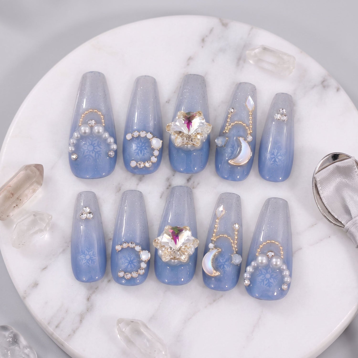 Frozen Moonlight handmade press-on nails with icy blue gradient, snowflakes, moon, pearls and crystals
