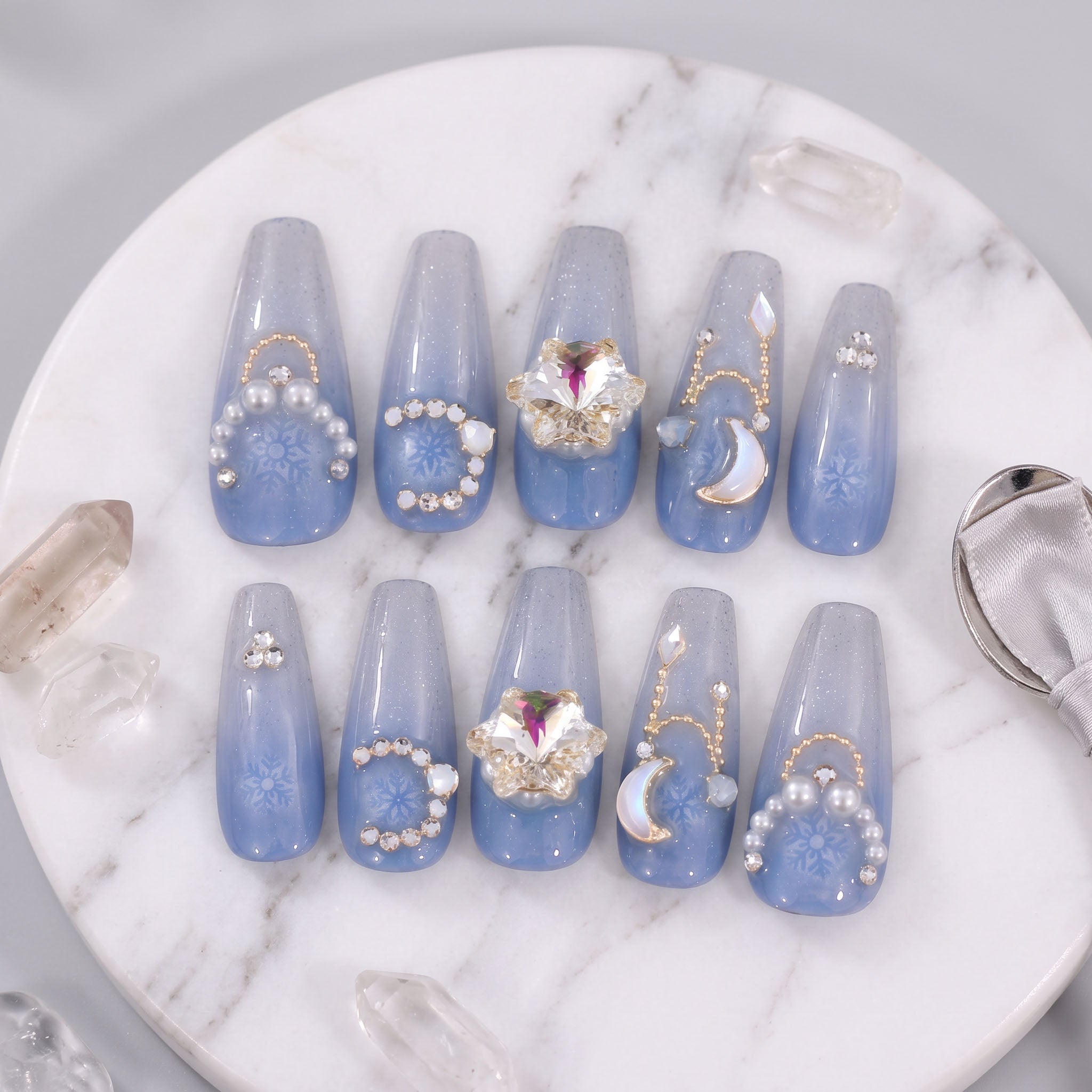 Frozen Moonlight handmade press-on nails with icy blue gradient, snowflakes, moon, pearls and crystals