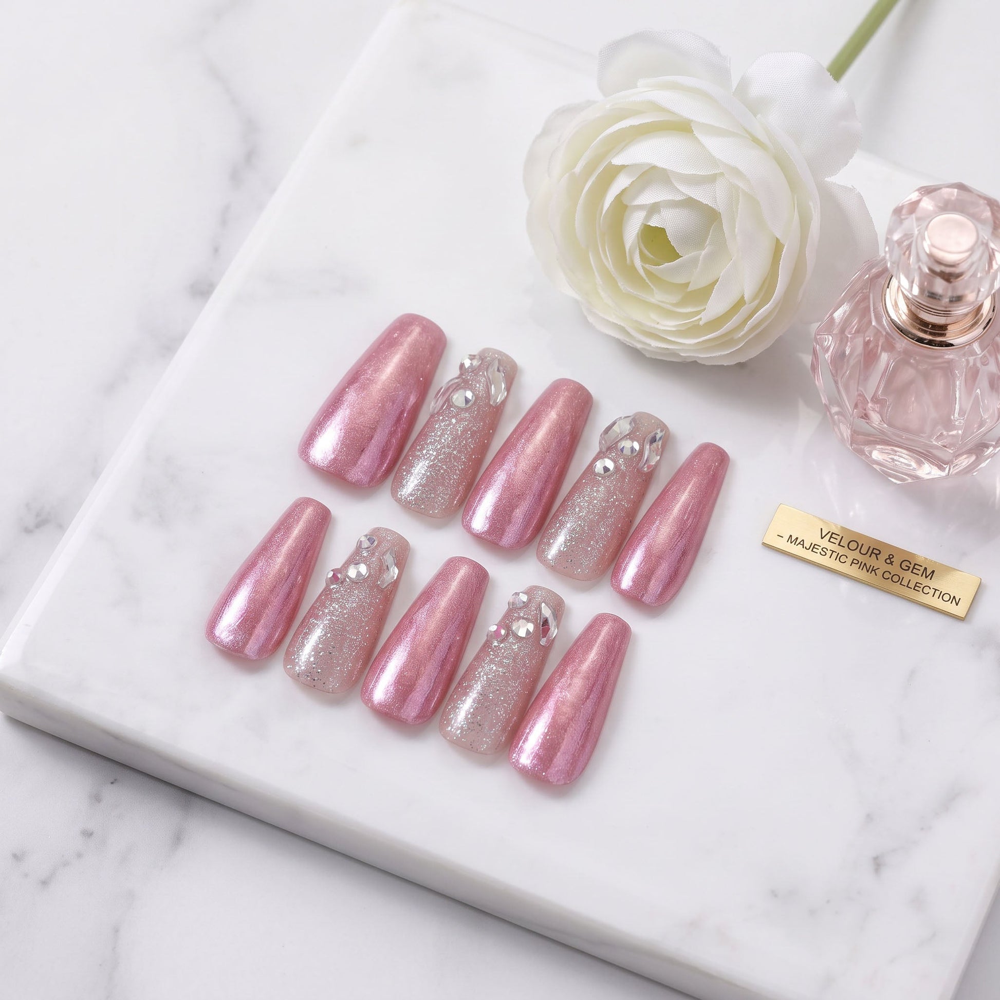 Pink Champagne handmade press-on nails with metallic pink, silver glitter and crystal accents